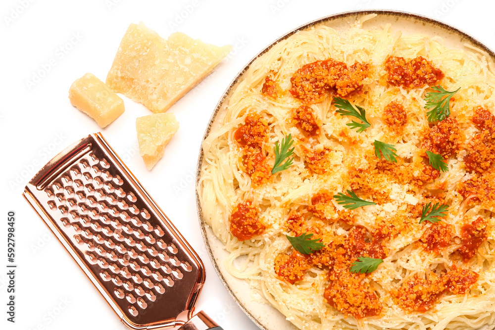 Plate of tasty Italian pasta with Parmesan cheese on white background, closeup