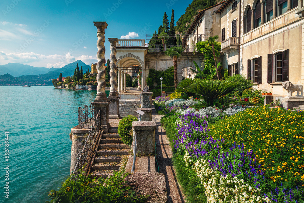 Flowery ornamental garden of villa Monastero with lake Como, Italy