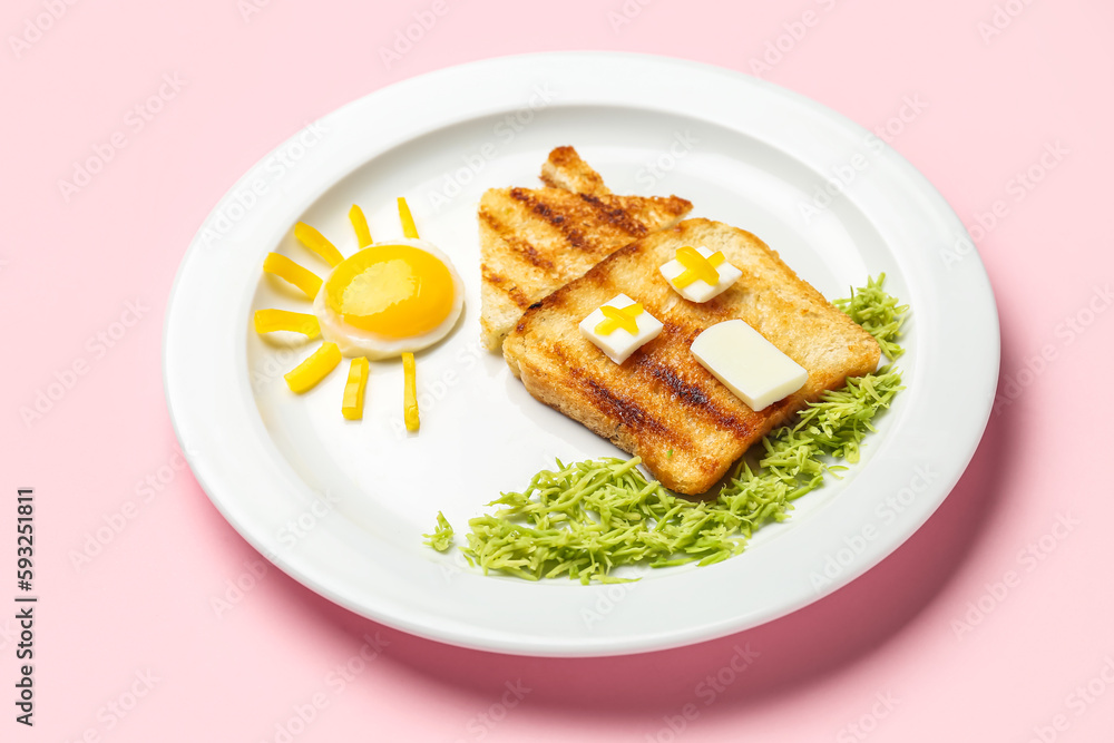 Plate with funny childrens breakfast in shape of house on pink background