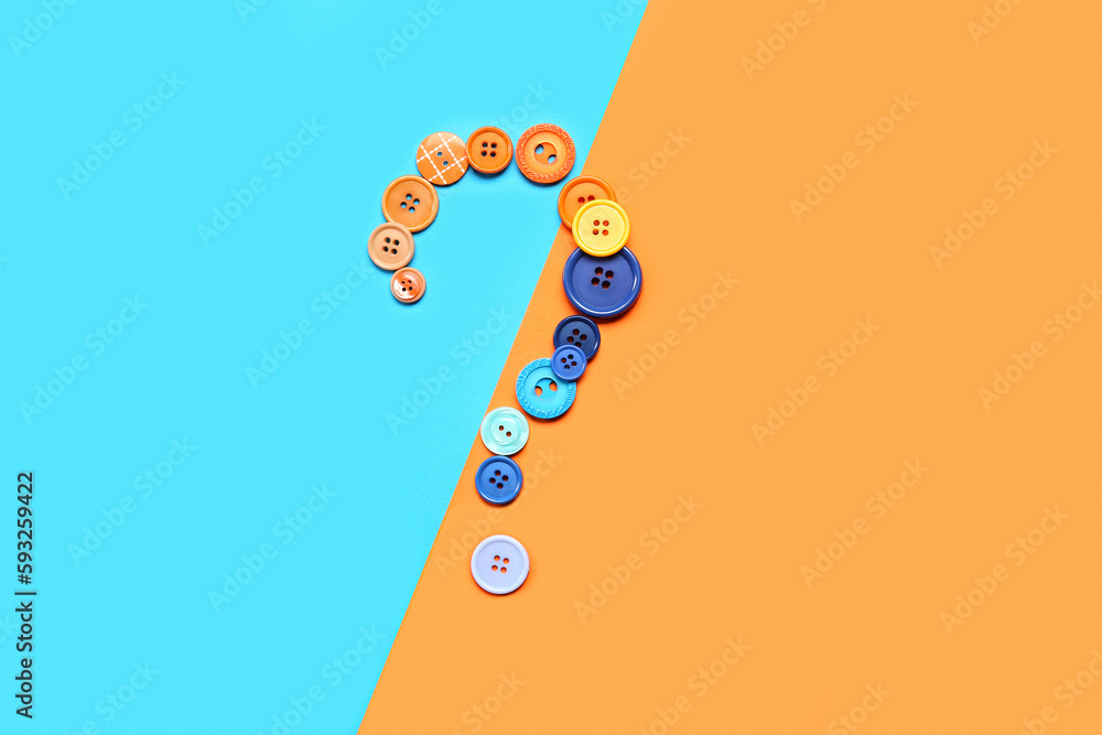 Question mark made of buttons on color background