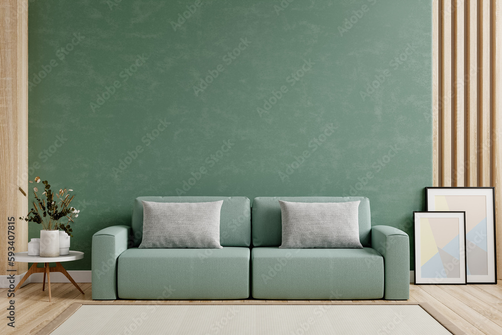 Mockup green wall with green sofa and decor in living room.