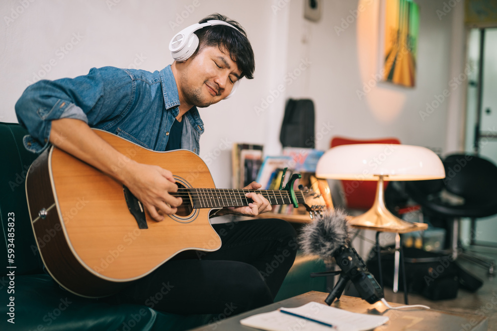 Artist composer in work process, people relaxing time with instrument. A songwriter or composer.