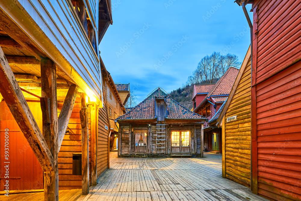 Old wooden building in Bryggen heritage site at dusk, Bergen, Norway