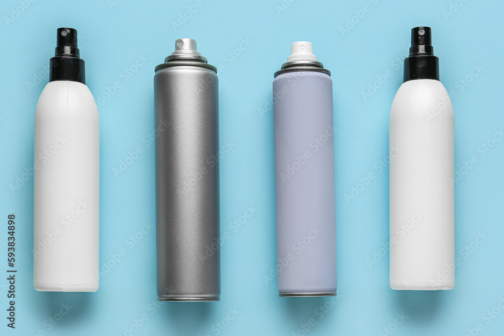 Set of hair sprays on color background