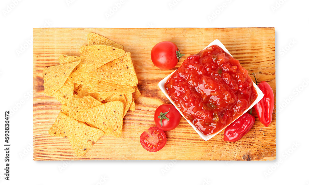 Board with bowl of delicious salsa, nachos and ingredients isolated on white background