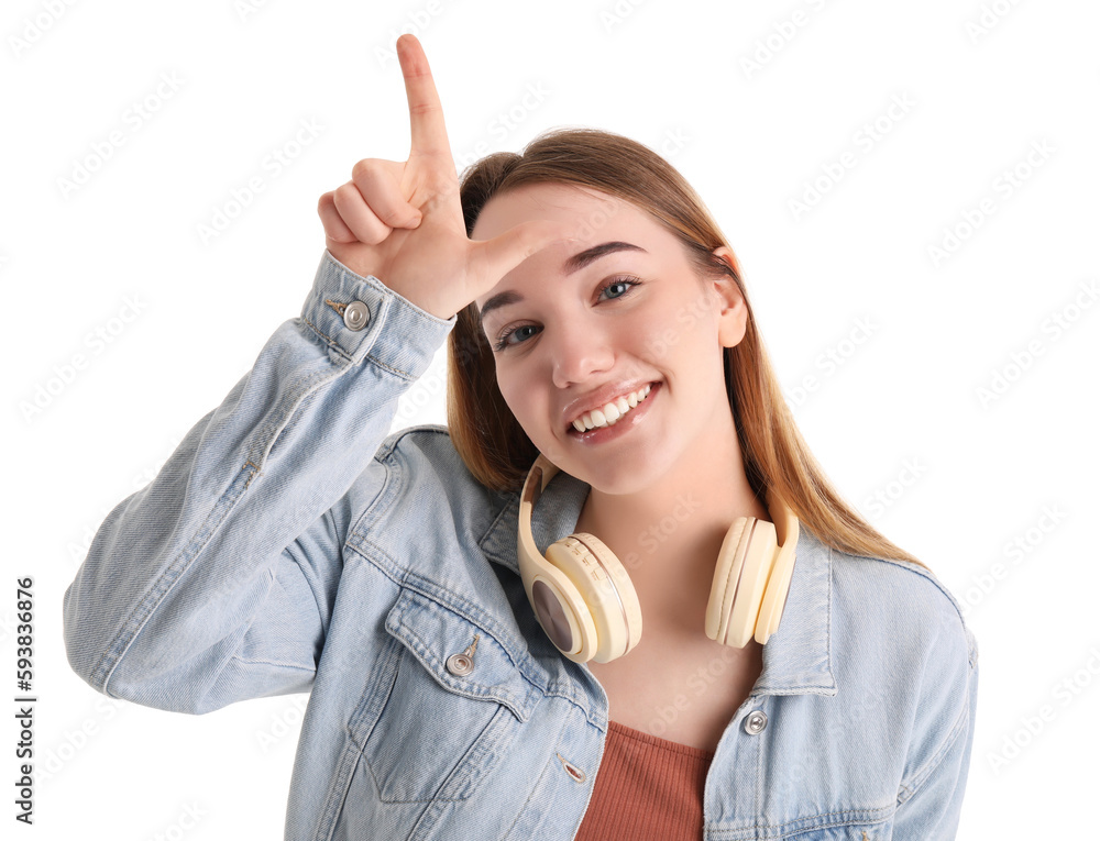 Young woman showing loser gesture on white background