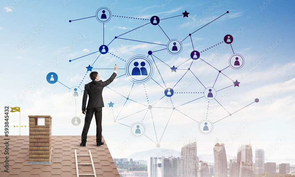 Businessman on house roof presenting networking and connection concept. Mixed media