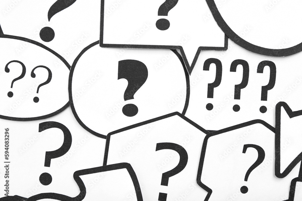 Speech bubbles with question marks, closeup