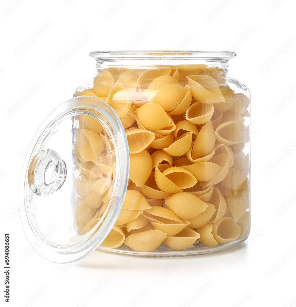 Jar of raw conchiglie pasta isolated on white background