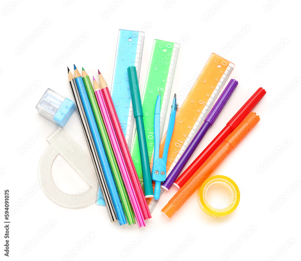 Colorful stationery supplies on white background