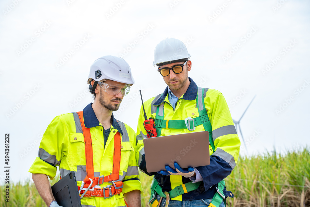 Engineers inspection wind energy generation,Wind turbine farm generator by alternative green energy.