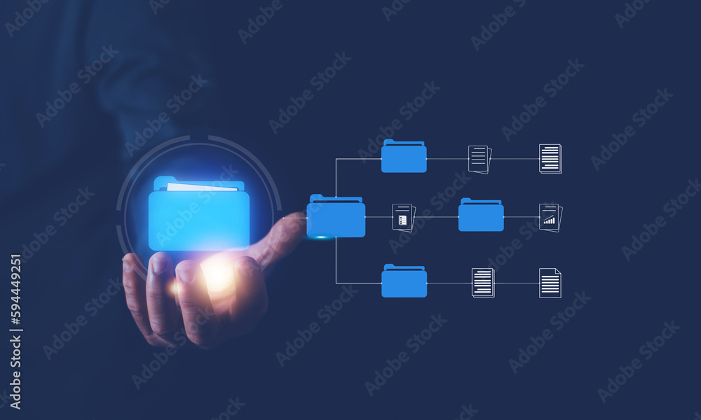 Hand holding file folder on virtual screen, Document management system (DMS) concept, Online documen