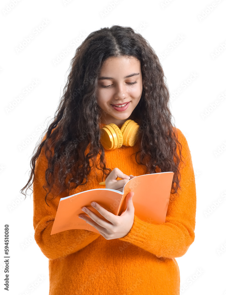 Female student writing in copybook on white background