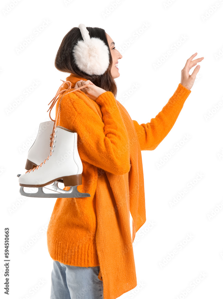 Pretty young woman with ice skates isolated on white background