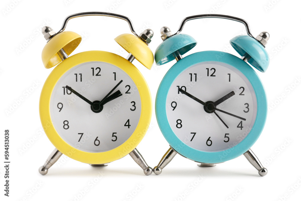 Colorful alarm clocks isolated on white background