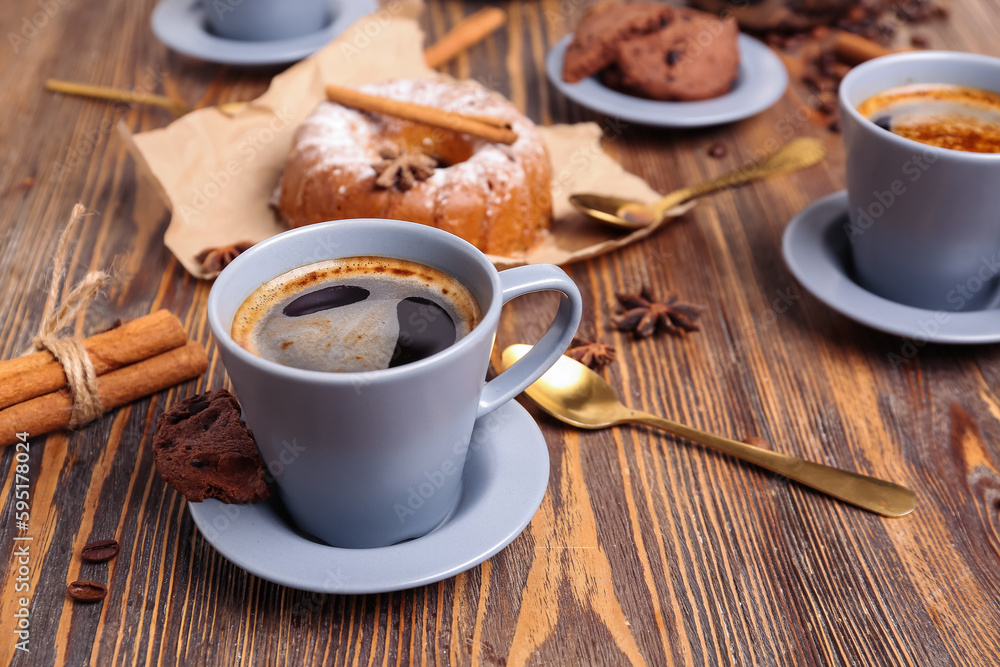 Cup of coffee on wooden table, closeup