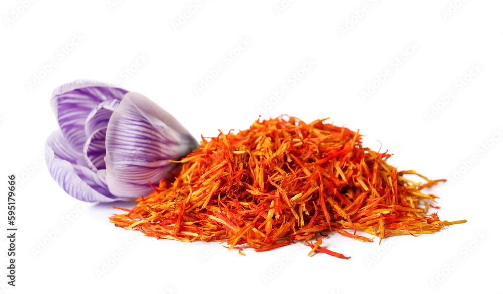 Heap of dried saffron threads and crocus flower isolated on white background