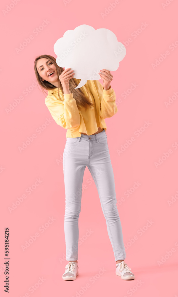 Young woman with blank speech bubble on pink background