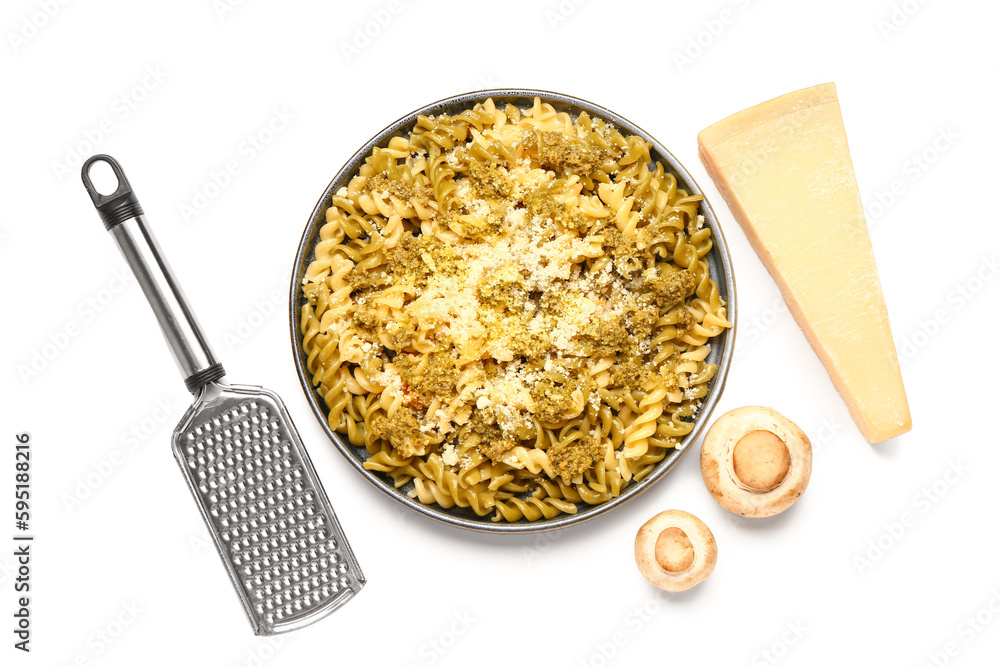 Plate of tasty Italian pasta with Parmesan cheese on white background