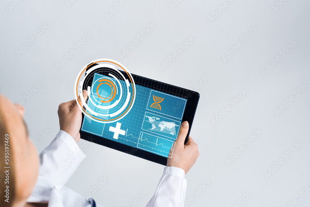 Close of female doctor hands working with tablet pc computer