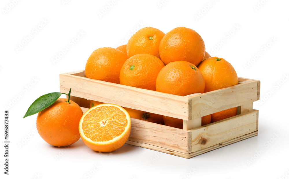 Fresh oranges with water droplets in wooden crate isolated on white background. Clipping path.