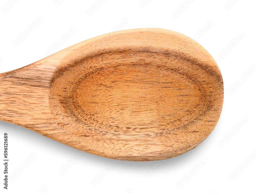 Empty wooden spoon on white background, closeup