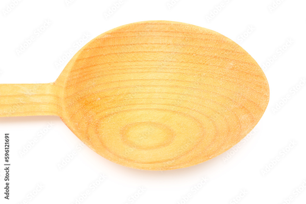 Empty wooden spoon on white background, closeup