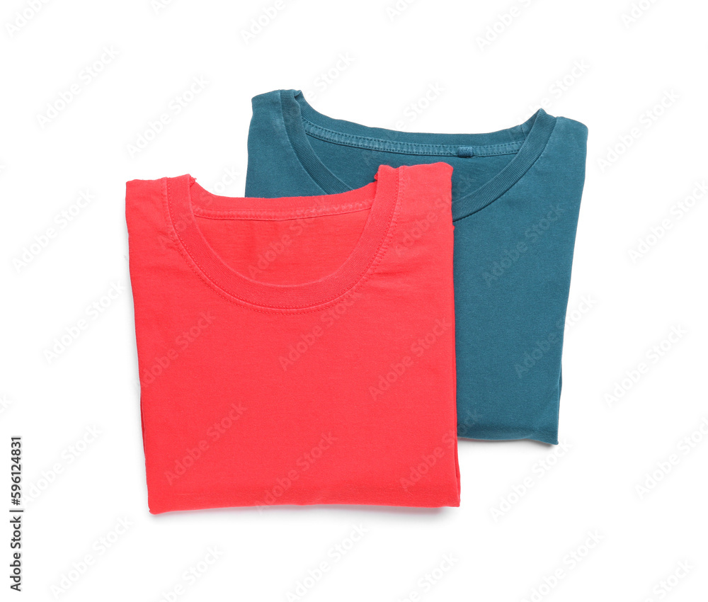 Folded blue and red t-shirts on white background