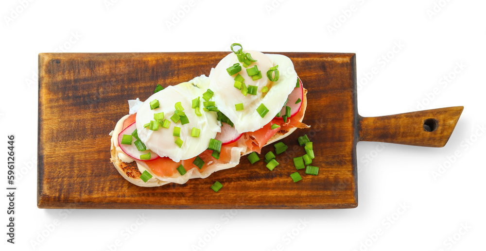 Wooden board with tasty eggs Benedict isolated on white background