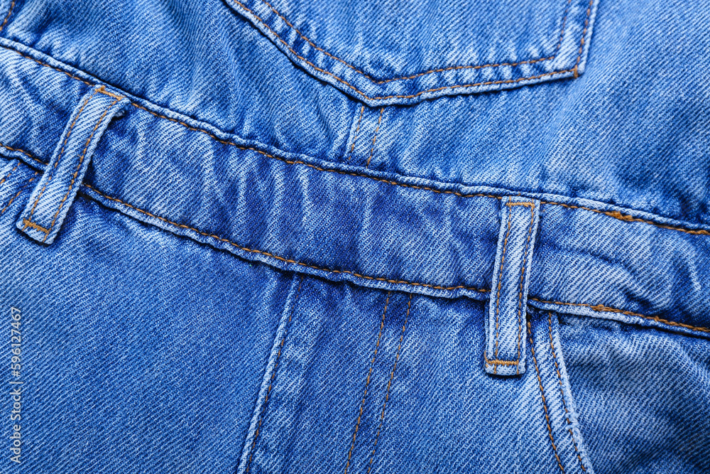 Denim jumpsuit as background, closeup