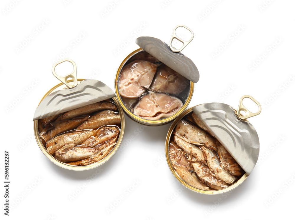 Opened tin cans with different fish isolated on white background