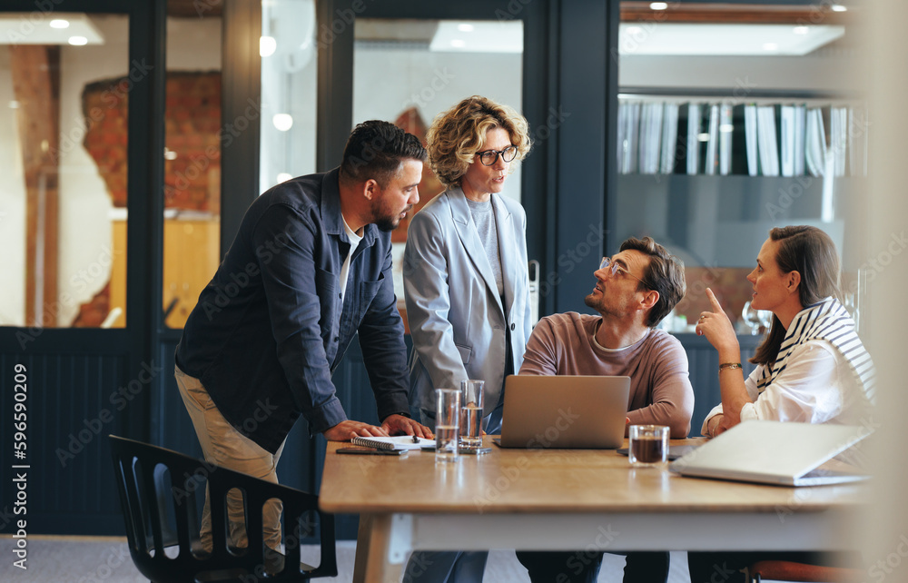 Business people having a meeting in a digital marketing agency