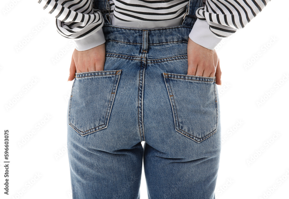 Young woman in denim jumpsuit on white background, back view