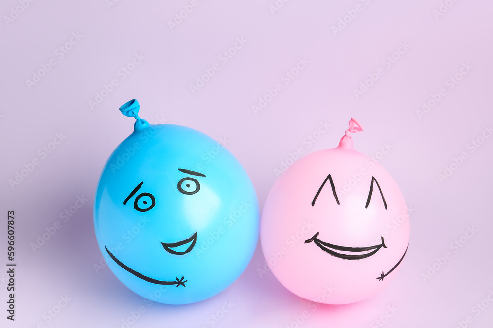 Balloons with happy faces for Friendship Day on pink background