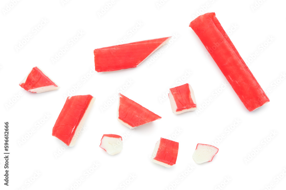 Tasty cut crab sticks isolated on white background