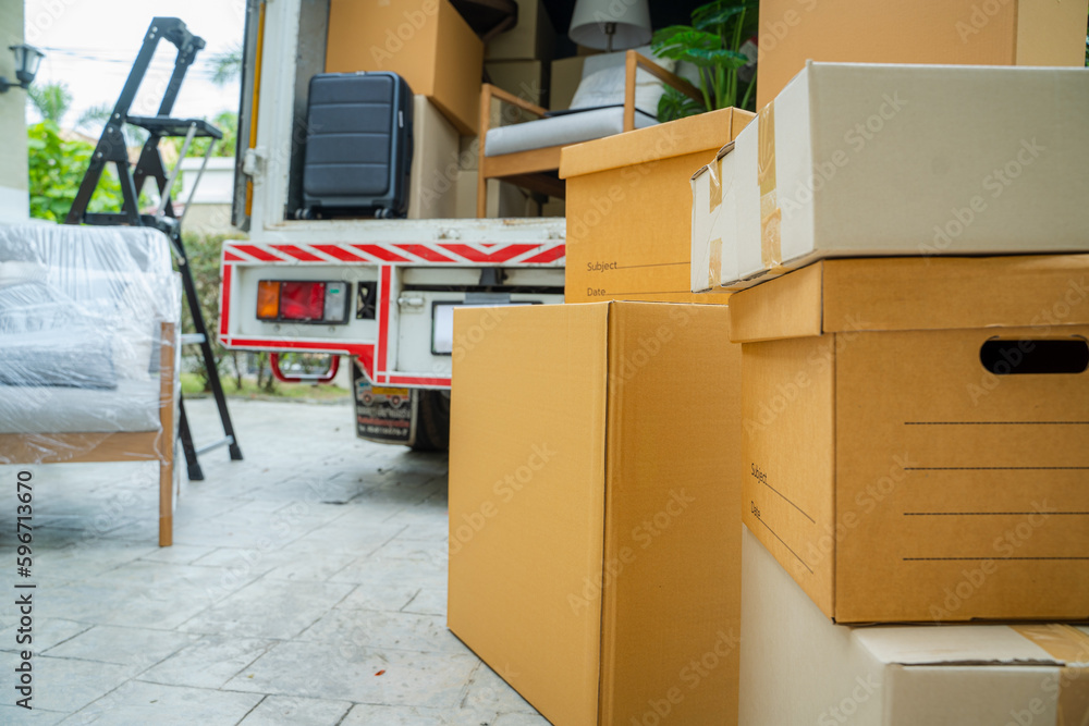 House moving service,Boxes waiting to be moved into a new home.