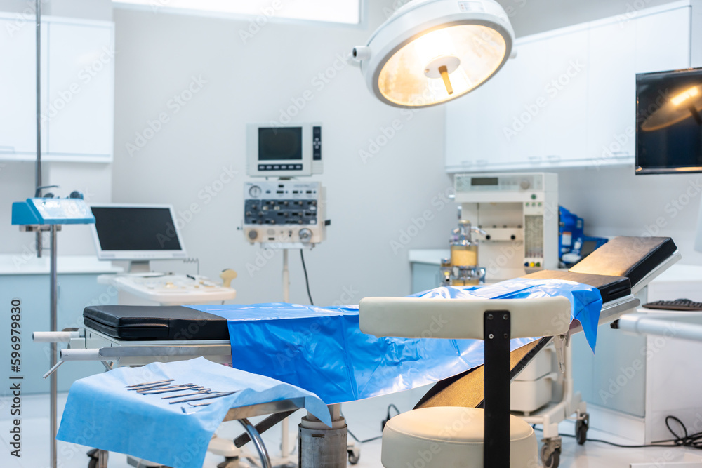 Modern operating room with surgical instruments equipment and tool.