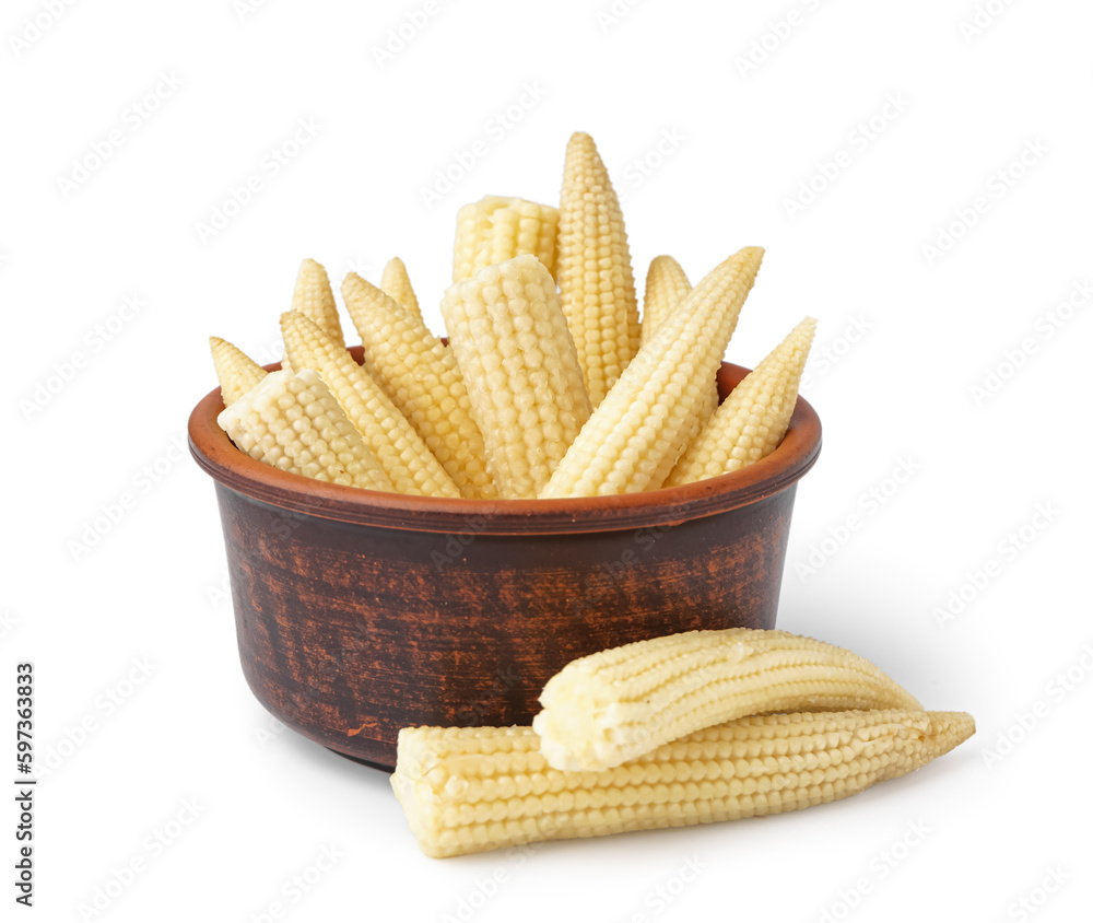 Bowl of tasty canned corn cobs on white background