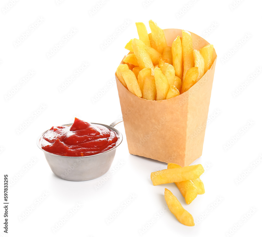 Paper box with tasty french fries and ketchup isolated on white background