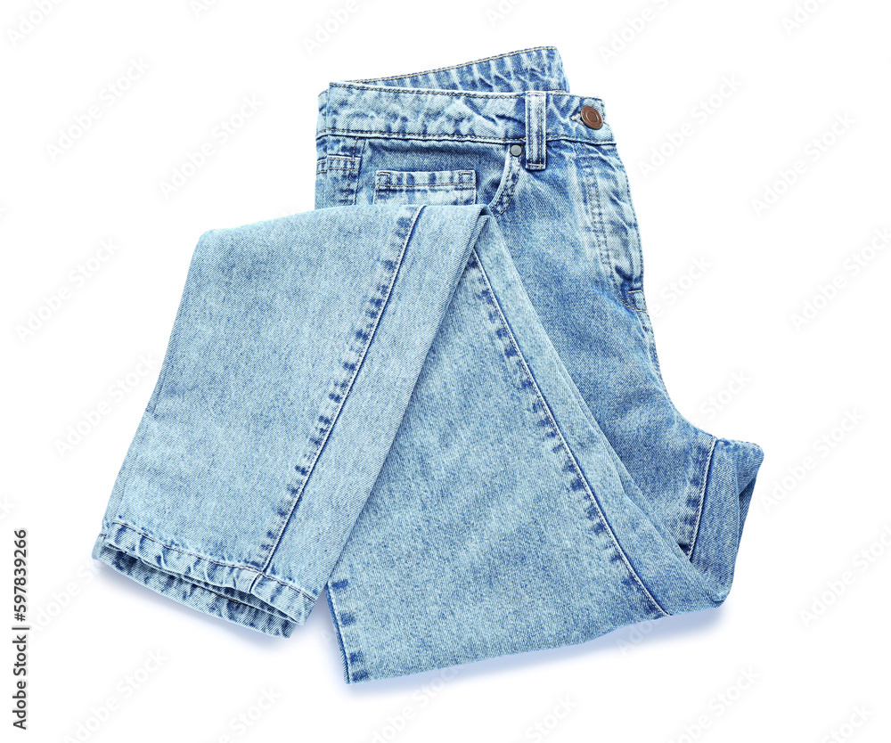 Folded jeans on white background