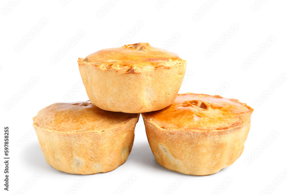 Tasty meat pot pies on white background