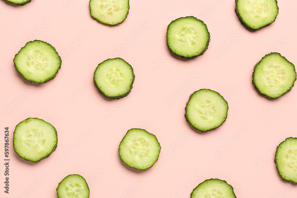 Slices of cucumber on pink background