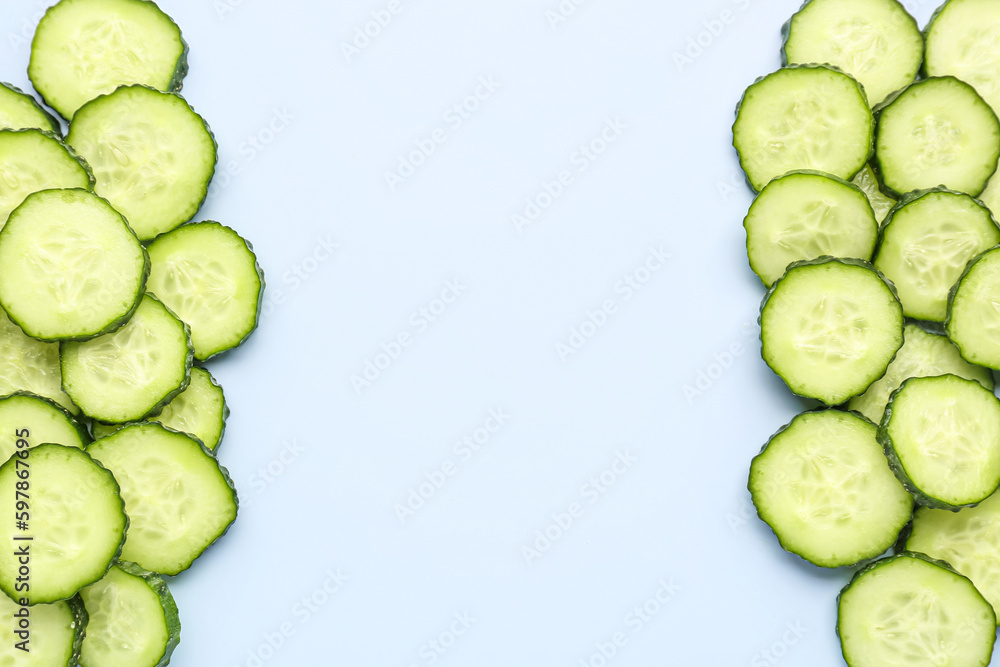 Slices of cucumber on blue background