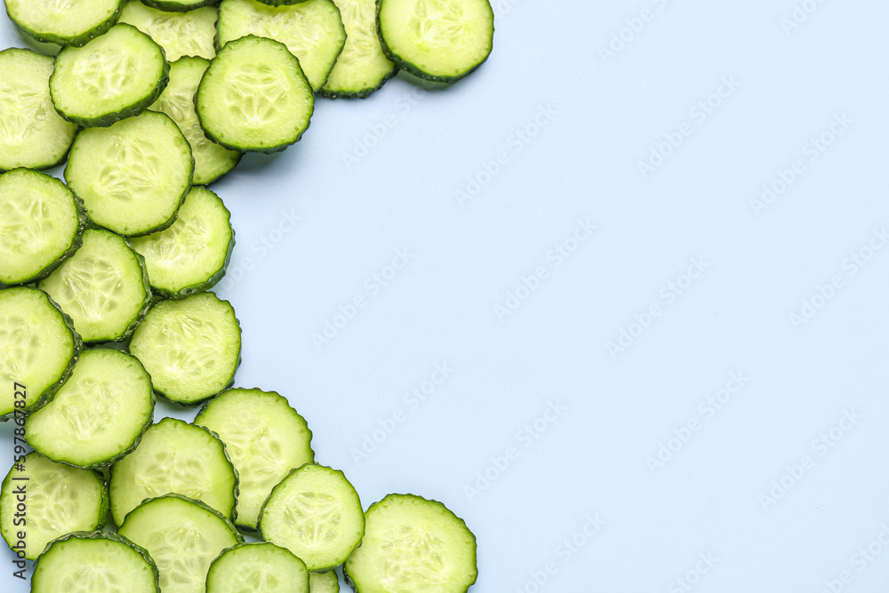 Slices of cucumber on blue background