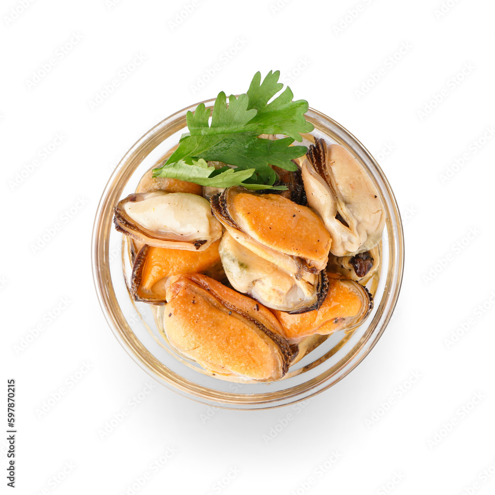 Marinated mussels with parsley in glass bowl on white background