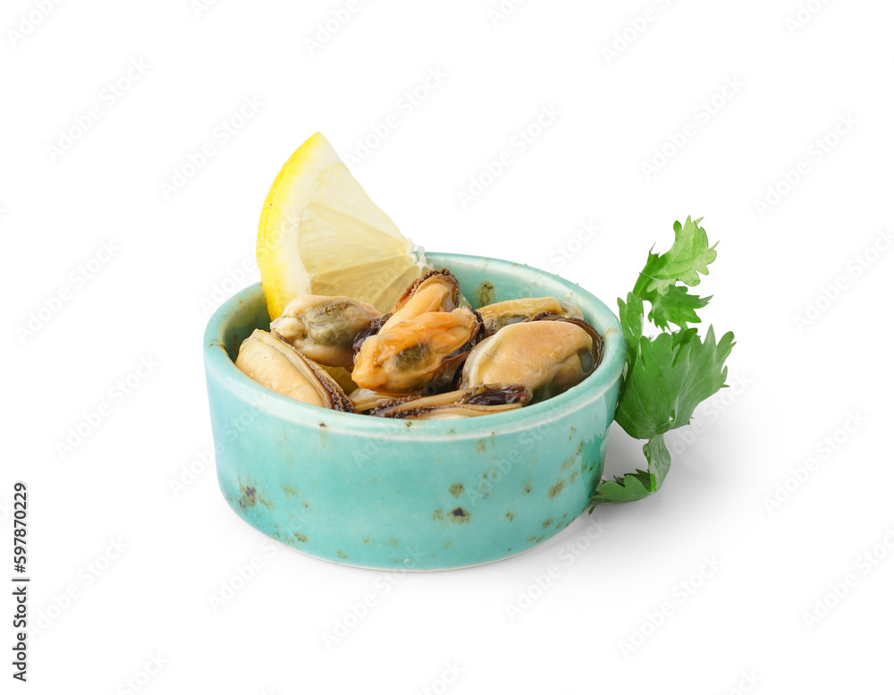 Marinated mussels with lemon slice in bowl and parsley on white background