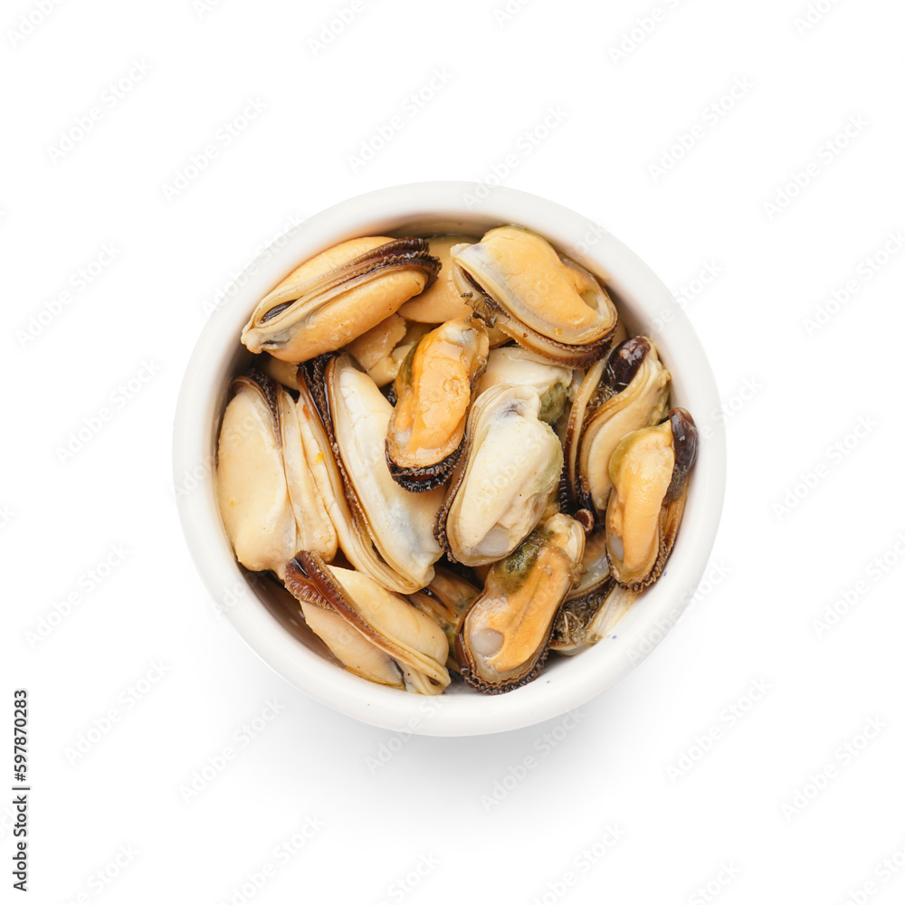 Marinated mussels in bowl on white background