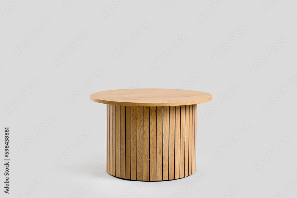 Clean wooden coffee table on grey background