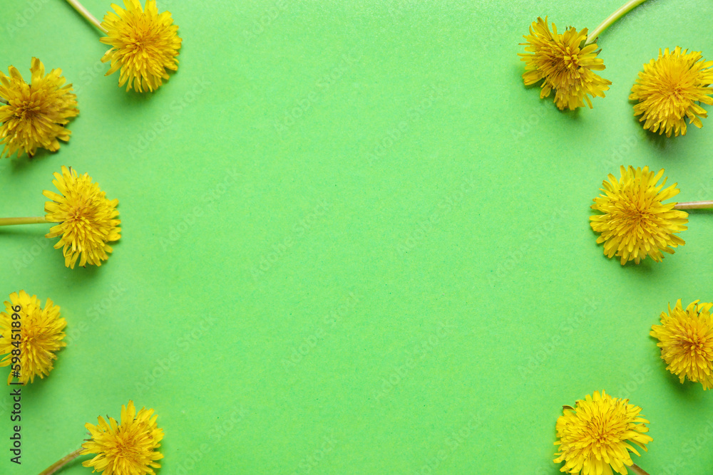 Bright yellow dandelions on green background