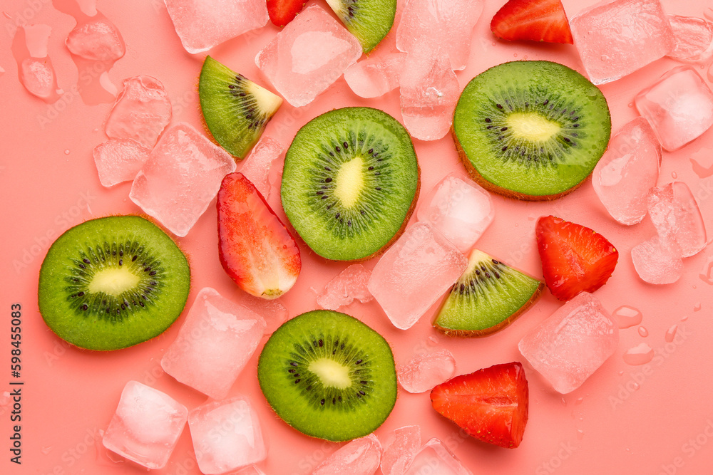 Sliced fresh strawberry with kiwi and ice on pink background